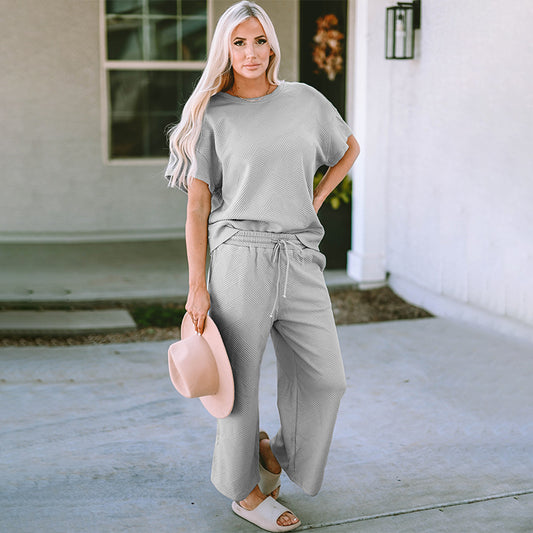 Traje de pantalón holgado de manga corta para mujer
